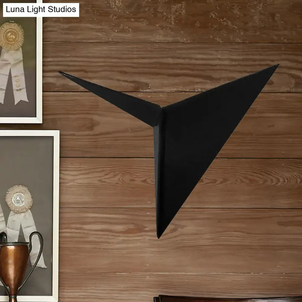 Black geometric wall lamp with modern angular triangle sheet design for bedroom sconce light fixture
