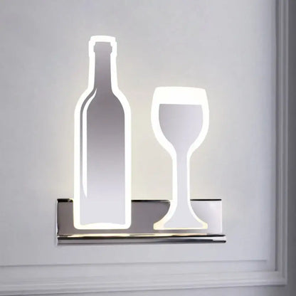 Modern black wine sconce light with chrome finish featuring illuminated bottle and wine glass silhouettes for dining room