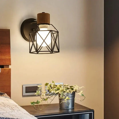 Modern black wooden wall light with industrial metal cage, wooden top cap, and exposed bulb for living room decorbites black wooden