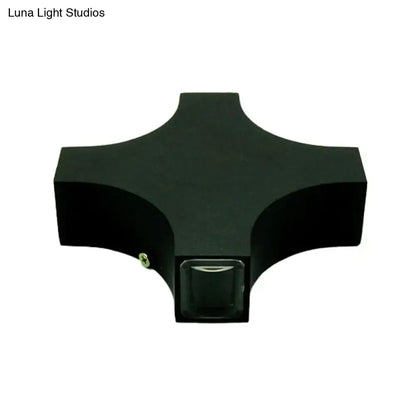 Modern black x shaped wall mount lamp with matte finish and central glass panel featuring rgb color led lighting