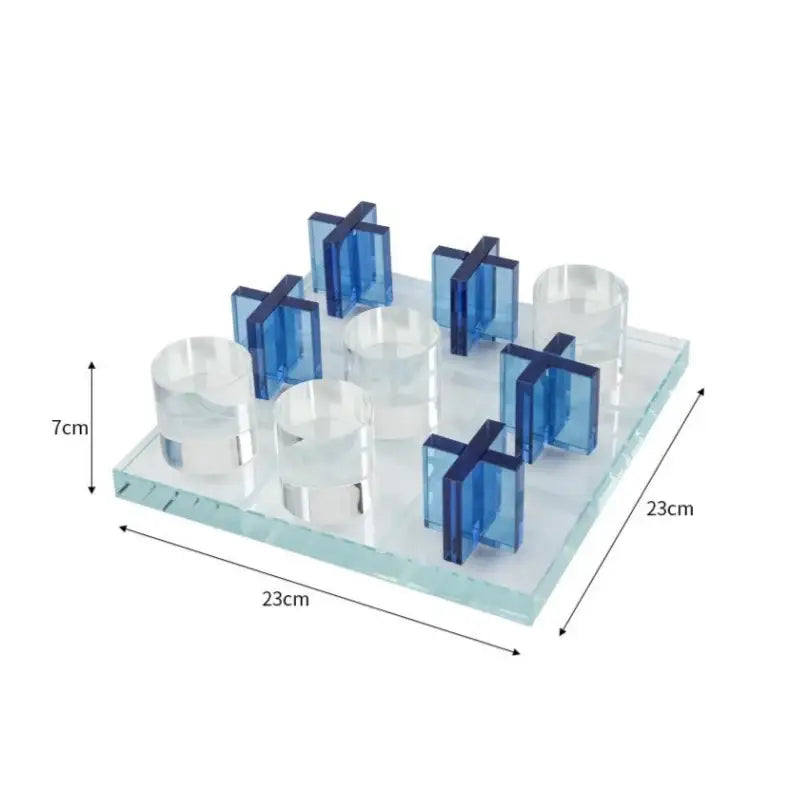 Transparent glass tic-tac-toe chess set with blue and clear acrylic pieces from decorbites crystal chessboard collection