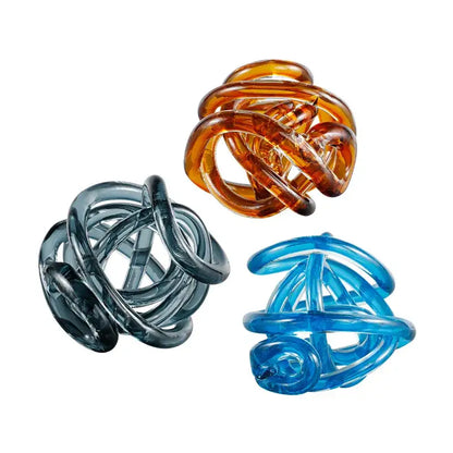 Three translucent glass coil ball decorative figurines in amber gray and blue for modern living room decor