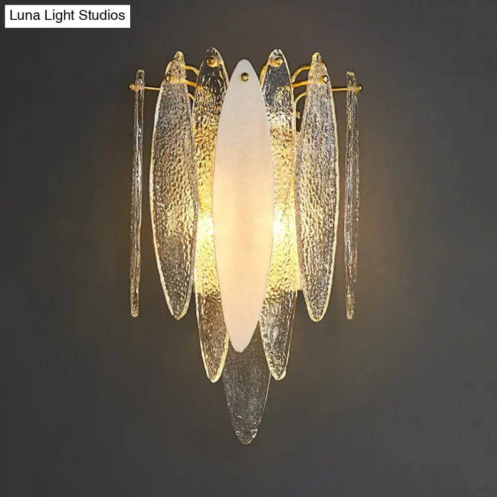 Gold-toned wall lamp with textured blue and amber glass fish elements and frosted oval diffuser compatible with led incandescent fluorescent 110v-120v 220v-240v