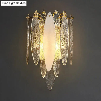 Gold-toned wall lamp with textured blue and amber glass fish elements and frosted oval diffuser compatible with led incandescent fluorescent 110v-120v 220v-240v