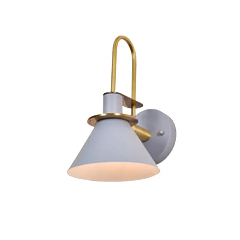 A modern blue and brass pyramid wall sconce with a matte gray conical shade compatible with e26 e27 bulbs