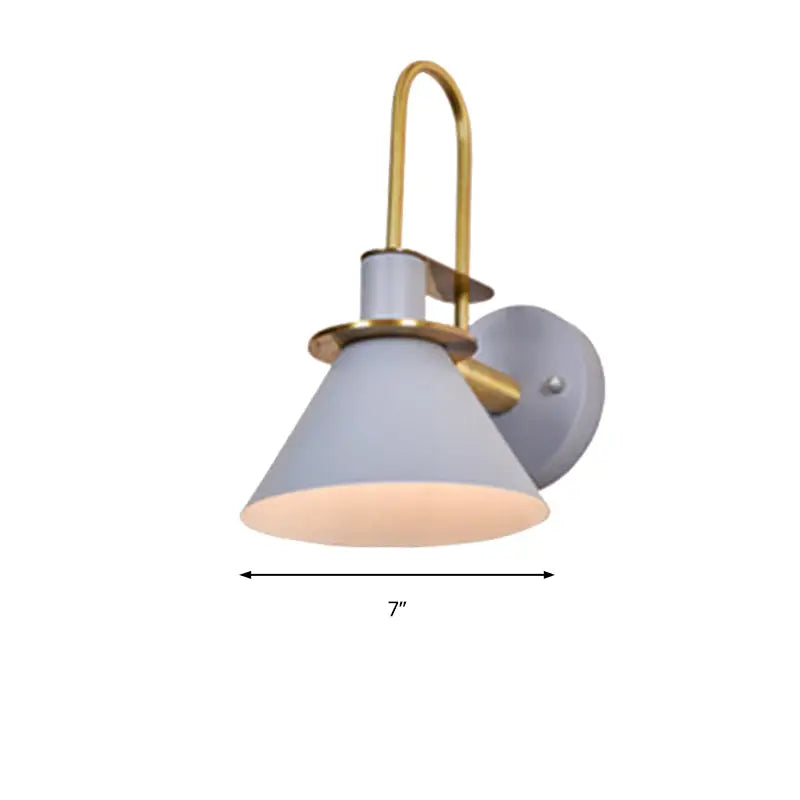 A modern blue and brass pyramid wall sconce with matte gray shade and polished brass accents compatible with e26 e27 bulbs