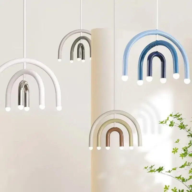 Modern blue and wood pendant lamp featuring colorful metal rainbow-shaped lights in white silver blue and beige decorbites colorful metal