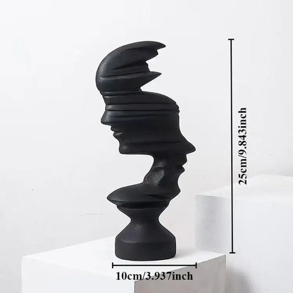 Black abstract ceramic sculpture featuring layered stacked human face profiles for modern living room decorbites abstract human face decor