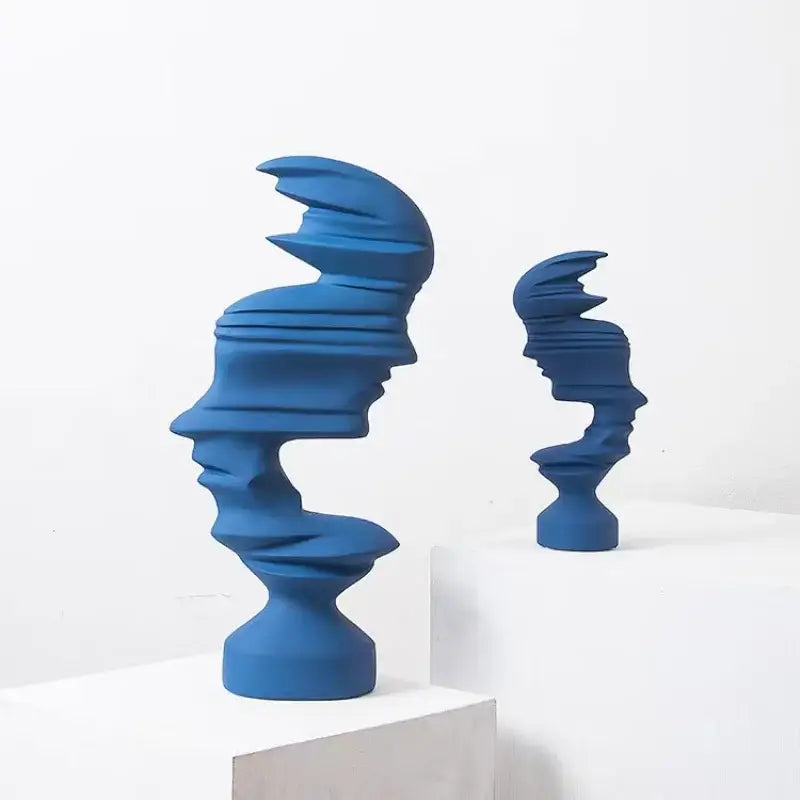 Modern blue ceramic abstract human face sculpture with layered twisted profile for living room decor