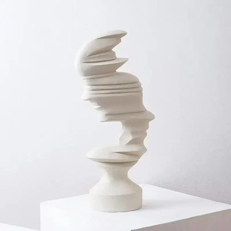 Modern off-white ceramic abstract human face sculpture with spiraling layered design for living room decorbites decor