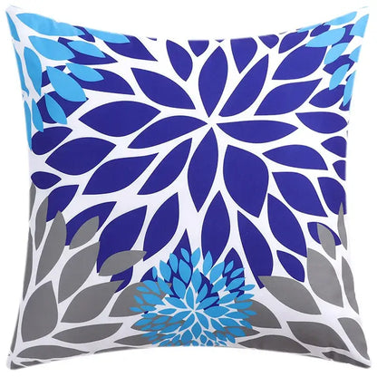 Square cushion cover with bold stylized blue floral pattern on white background for modern living room decorbites decor