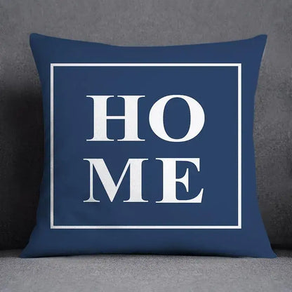 Navy blue square pillow with home in bold white letters and modern geometric floral design for living room cushion