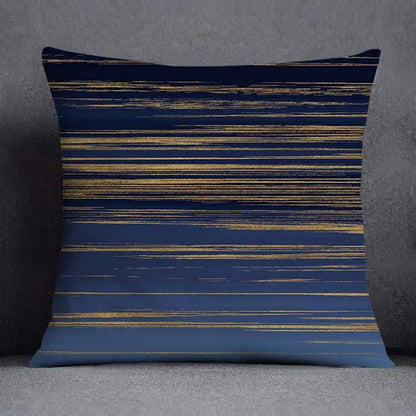 Navy blue throw pillow with horizontal gold foil streaks featuring a modern geometric floral design for living room