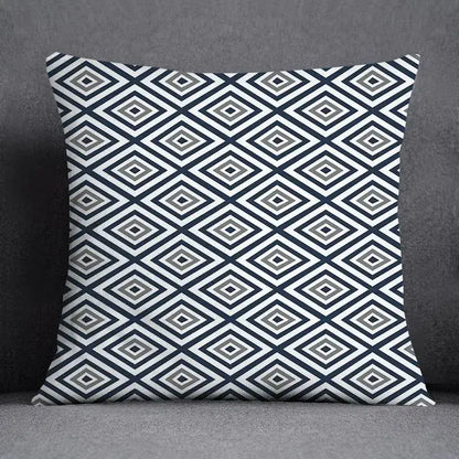 Square throw pillow with modern geometric floral design in navy blue white and gray for living room decor