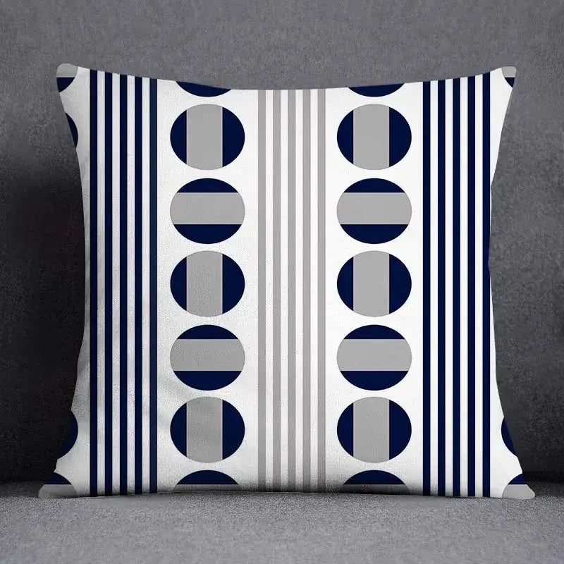 Modern blue geometric floral design throw pillow with navy blue gray and white vertical stripes and circles for living room