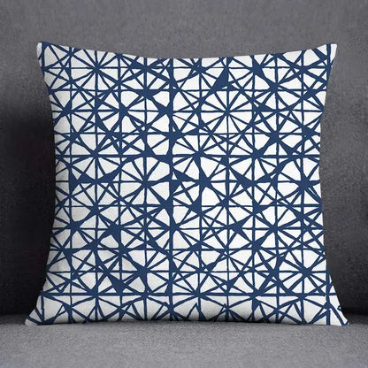 Modern blue geometric floral design pillowcase with bold navy blue pattern on white for living room cushion
