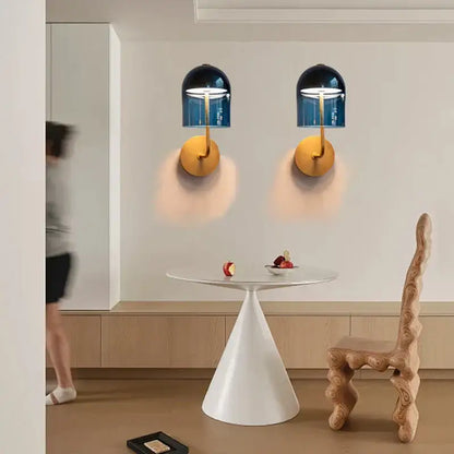 Modern blue glass dome wall sconce lamp with gold-toned metal base ideal for bedroom wall sconce lamps