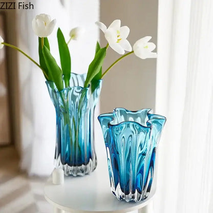 Two translucent blue glass hydroponic vases with wavy rims and textured ridges for modern office decorbites blue glass decor