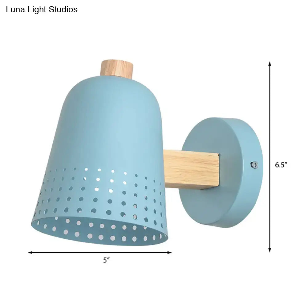 Modern blue metallic bell wall sconce with light blue perforated metal and natural wood accent for restaurant lighting