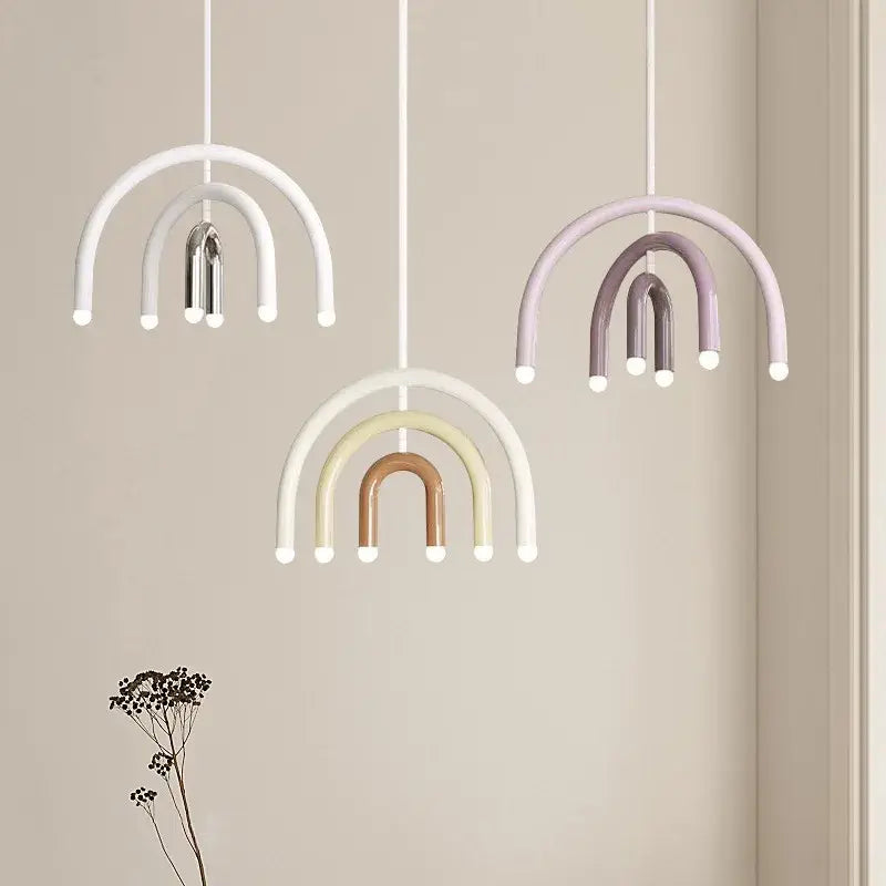 Modern blue and navy pendant light with pastel minimalist rainbow design and matte finish for dining room use
