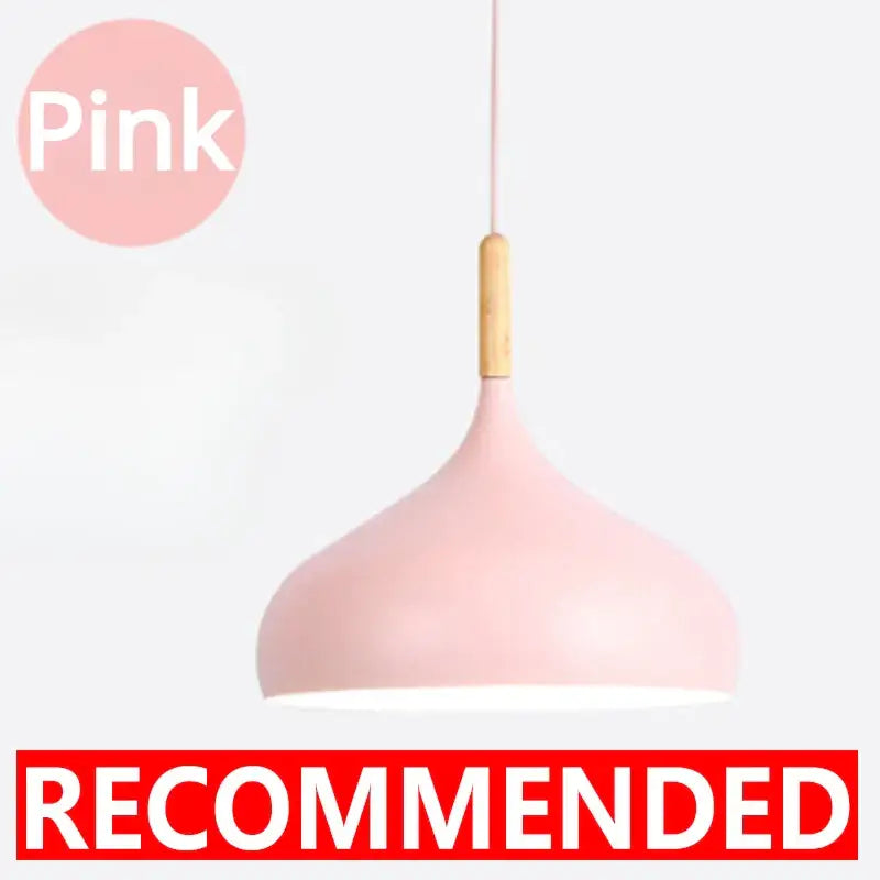 Modern pink pendant light with wood accent and matte finish helps create a stylish kitchen lighting solution
