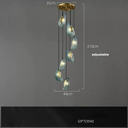 Modern blue queen crystal glass chandelier with brass mount and seven blue-green textured orbs for living room decorbites blue queen