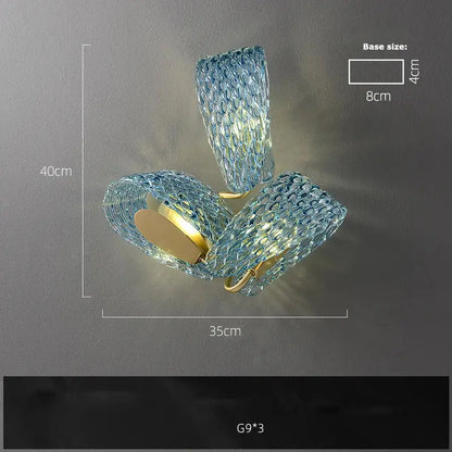 Modern blue queen crystal glass chandelier with blue glass mosaic wall sconce and gold-toned metal accents decorbites blue queen