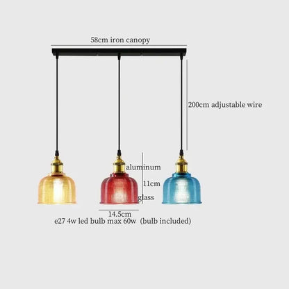 Set of three colorful glass led pendant lights with blue red glass and brass accents for modern dining room decorbites decor