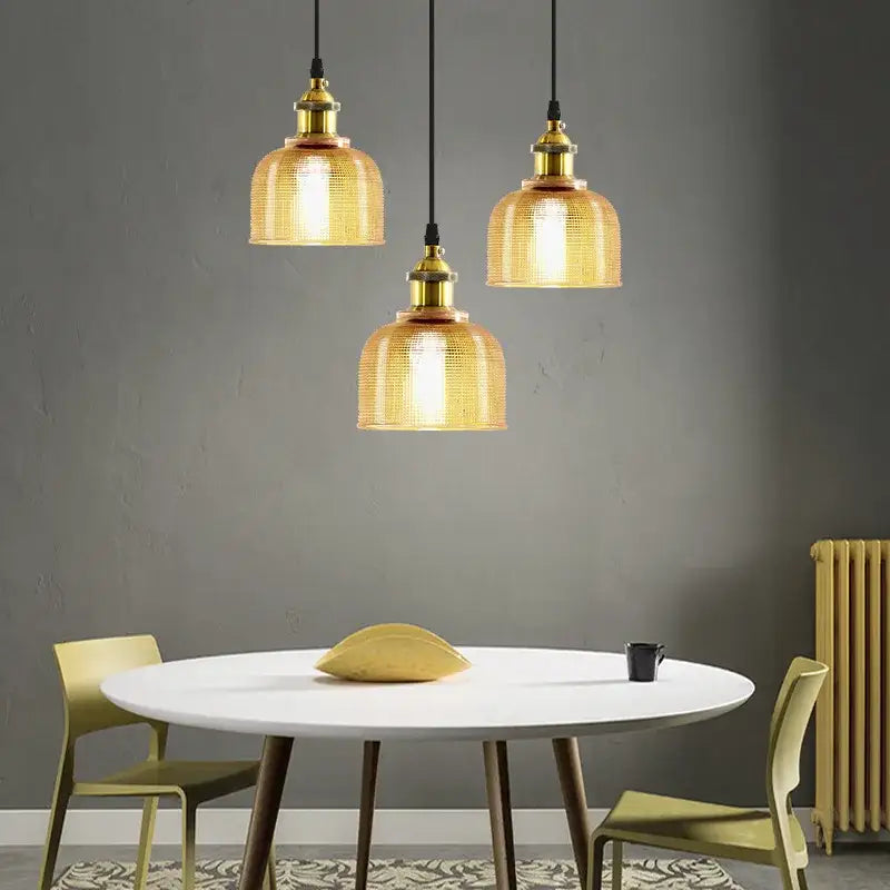 Modern blue red and gold glass led hanging lamp with golden brass fixtures and textured amber shades for dining decorbites colorful glass decor