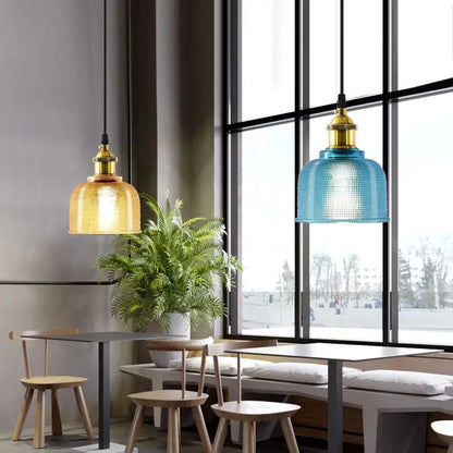 Two glass led hanging pendant lights with amber and blue textured shades and brass fixtures for dining room decorbites colorful glass