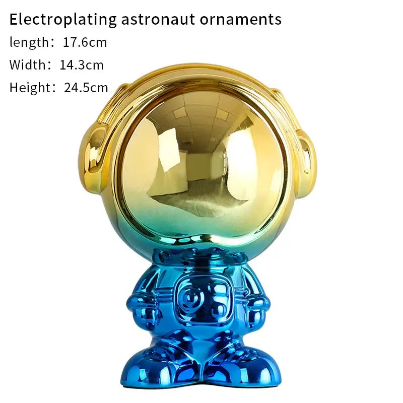 Modern blue and red gradient decorbites astronaut statue with glossy electroplated golden helmet for living room decor
