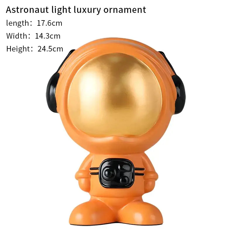 Modern blue and red gradient decorbites astronaut statue with glossy orange body and shiny gold helmet for living room decor