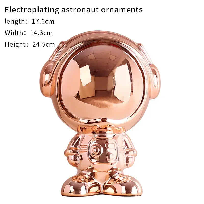 Modern blue and red gradient decorbites astronaut statue with rose gold electroplated suit and shiny reflective helmet