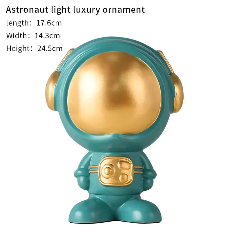 Teal and gold glossy astronaut statue with rounded helmet and metallic accents for modern living room decorbites astronaut statue
