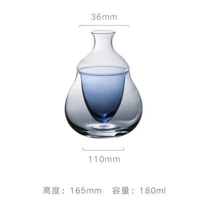 A sleek transparent glass wine pot with gradient blue interior and slender neck ideal as a wine pot ice jug
