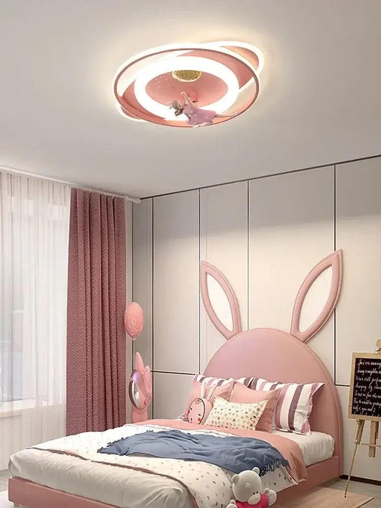 Modern blue and white airplane ceiling light with pink circular design featuring concentric rings for bedroom decorbites astronaut spaceman rocket decor
