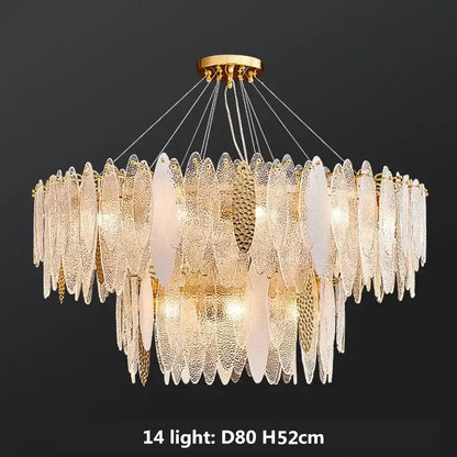 Gold-toned pendant lights with layered textured glass leaf-shaped shades featuring decorbites gold metal chain