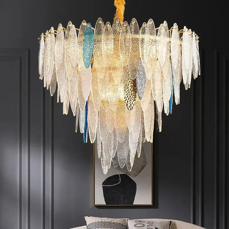 Modern blue and white leaf pendant lights with cascading textured glass shades and decorbites gold metal chain frame