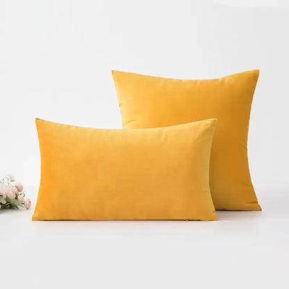 Two mustard-yellow velvet throw pillows featuring decorbites geometric tufted tassel cushion cover for living room decor