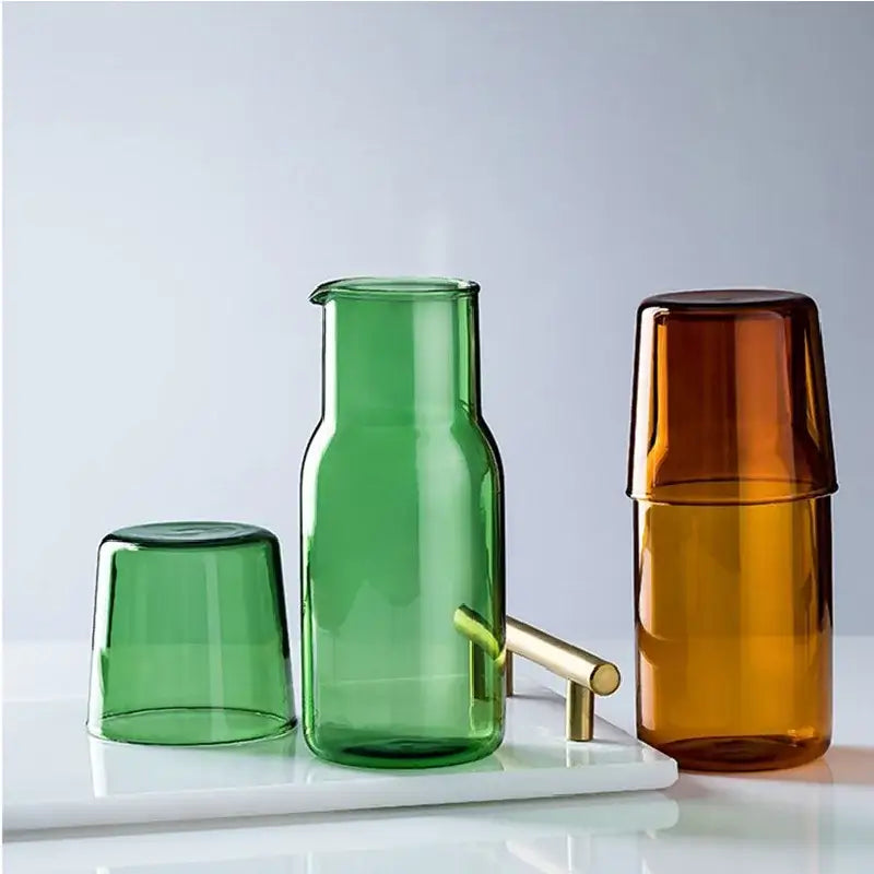 Modern borosilicate green glass tea pot with gold-tone handle and spout for kitchen fruit infusion