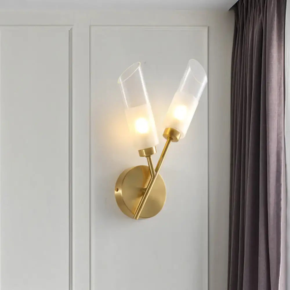 Modern brass 2-light glass wall sconce in gold tone with frosted shades suitable for 110v-120v and 220v-240v use