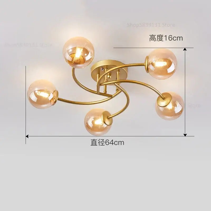 Modern brass ceiling light fixture with five curved arms and warm amber glass bulbs for kitchen use