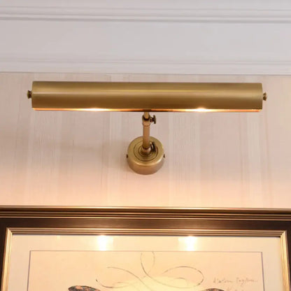Modern brass adjustable bathroom vanity sconce with elongated rectangular shade compatible with 110v-120v and 220v-240v