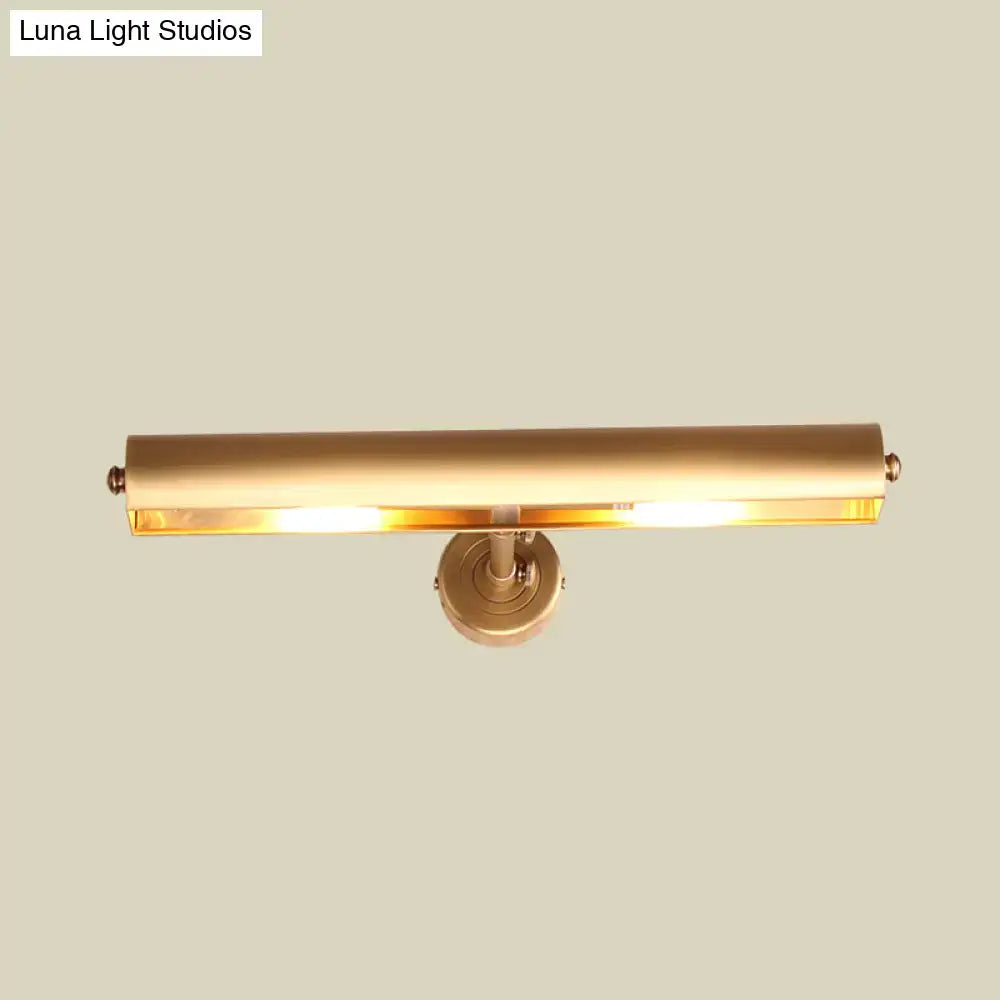 A sleek brushed brass modern bathroom vanity sconce with rectangular bar design and warm glow for 110v-120v use