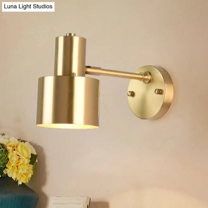 Modern brass adjustable wall spotlight with cylindrical shade and circular mounting plate for dining room 110v-120v use