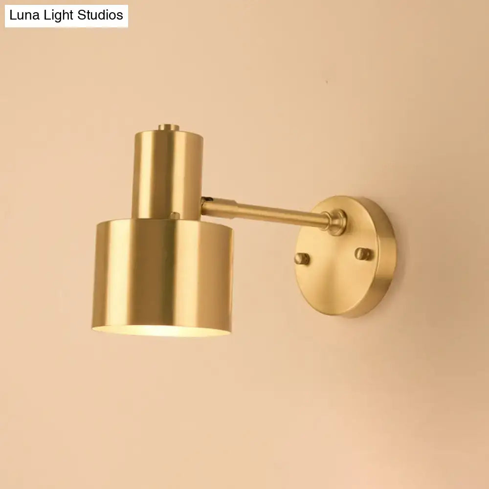 Modern brass adjustable wall spotlight with cylindrical shade and circular mounting plate for dining room 110v-120v use