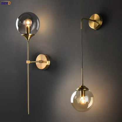 Modern brass and amber decorbites glass ball wall lamp with brass finish and spherical globe for bedroom led wall lighting