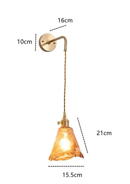 Modern brass and amber glass wall lamp featuring warm amber glass and brass-finished metal for bedroom decorbites amber glass