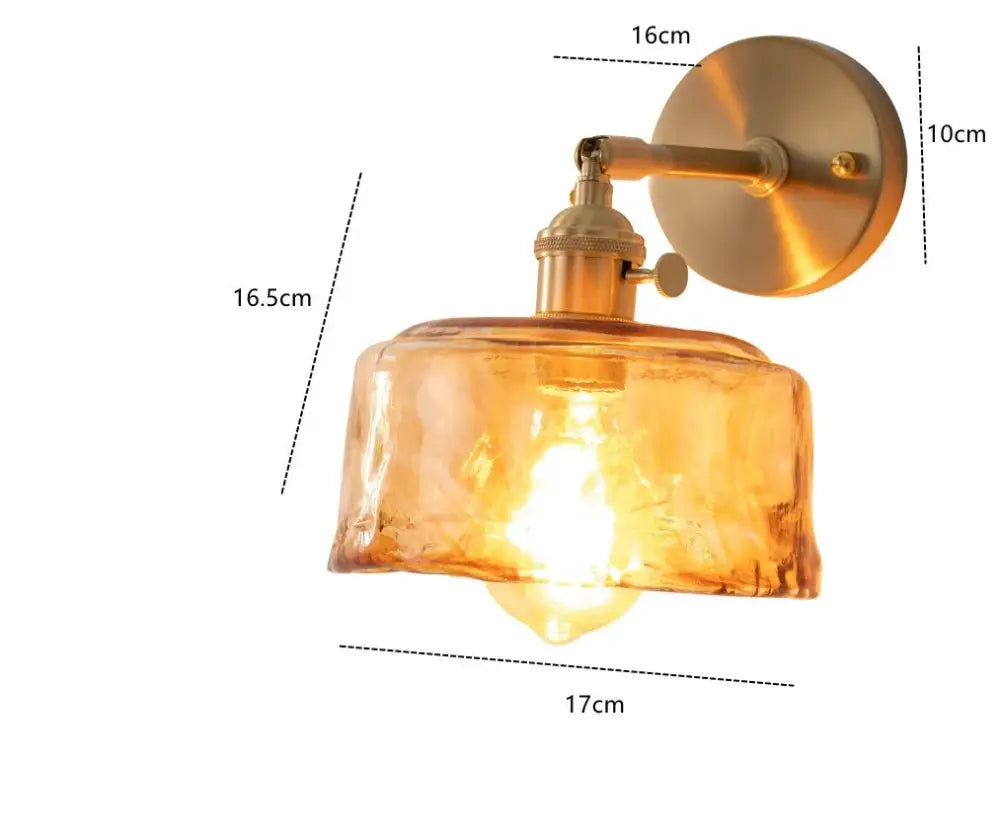 Modern brass and amber glass wall lamp with warm decorbites amber glass shade and exposed bulb for bedroom living room decor