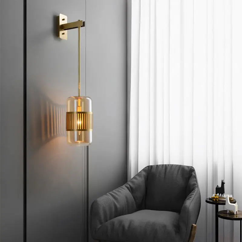 Modern brass and amber glass wall sconce with gold-toned cylindrical pendant glass shade and exposed bulb for modern wall light 220v-240v 110v-120v